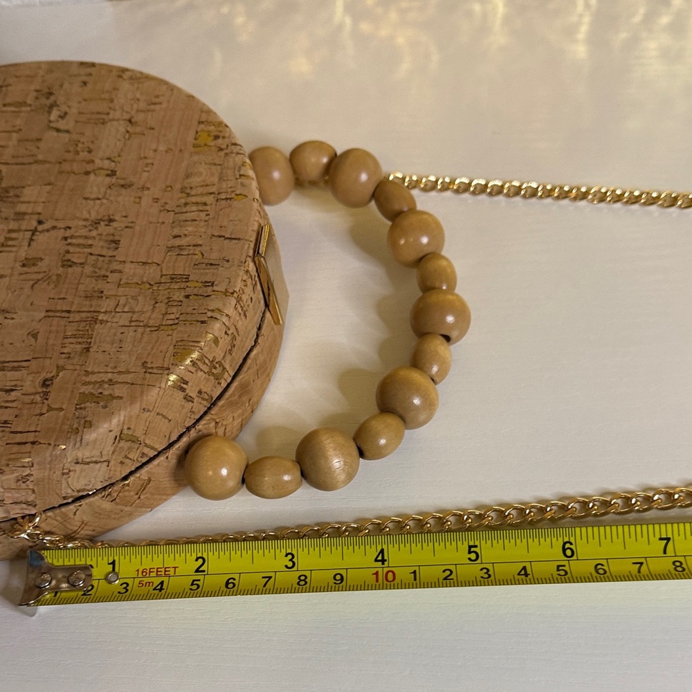 Tan Round Cork Crossbody with a wooden beaded top handle and gold tone chain - Picture 9 of 9